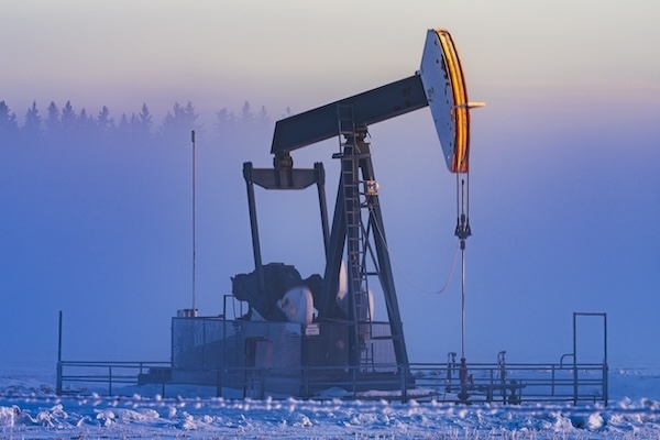 Oil pumping in winter in Alberta, Canada Oil pumping in winter in Alberta, Canada